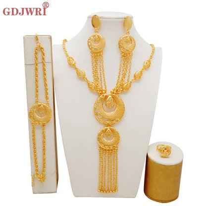 Luxurious Dubai gold colour jewelry set for women featuring an elegant bridal necklace, stylish earrings, a stunning bracelet, and a sophisticated ring designed with an African flair.