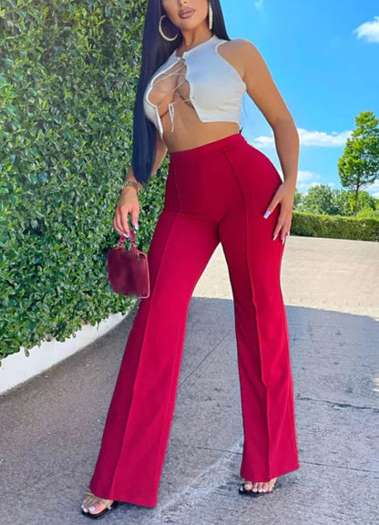 Luxurious high waist flare pants for women in solid color, perfect for office attire.