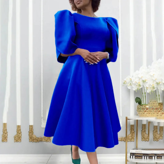 Elegant women's luxury pleated mid-calf dress in solid colour, showcasing a round neck design and half sleeves, perfect for upscale occasions.