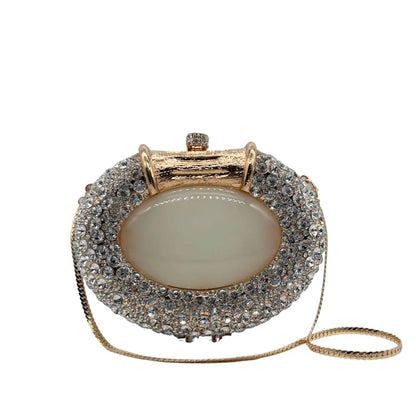 Exquisite women's metallic evening bag with crystal detailing, perfect for upscale parties and elegant gatherings.
