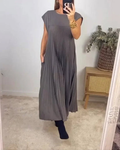 Beautifully draped ladies' maxi dress with a flattering silhouette, suitable for all body types, elevating summer wardrobes.