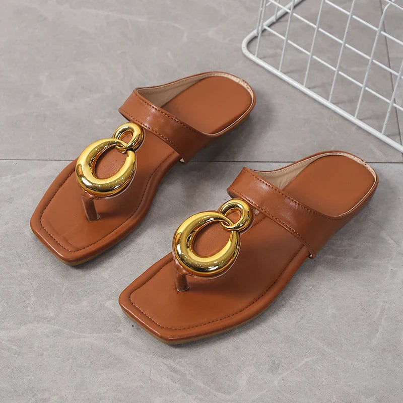 Fashionable women's sandals in a solid design, perfectly blending comfort and style for any indoor occasion.