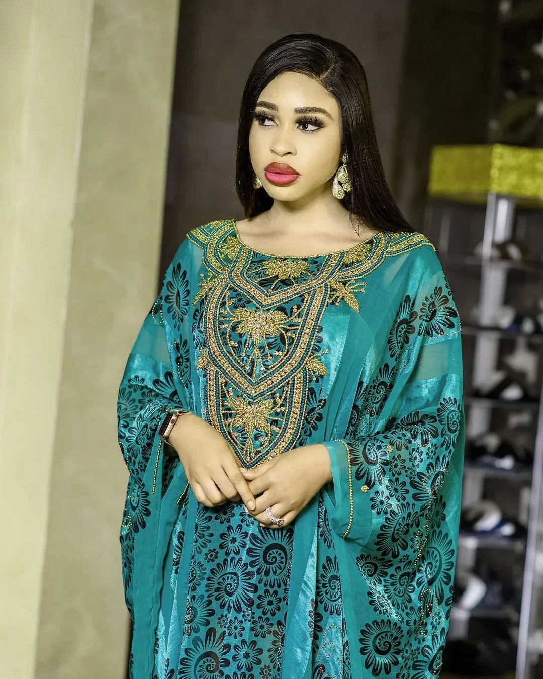 Chic African maxi dress with stylish long sleeves and polyester fabric, designed to flatter every silhouette and provide ultimate comfort.