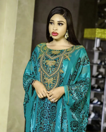 Chic African maxi dress with stylish long sleeves and polyester fabric, designed to flatter every silhouette and provide ultimate comfort.