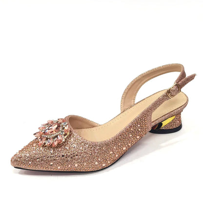 Stylish women's bag set matching champagne sandals, featuring a metal handle and chic design for fashionable outings.