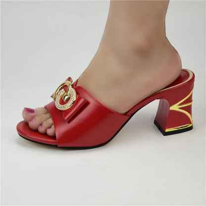 Sophisticated red ladies sandals with a 7.5 CM high heel, designed with fashion-forward metal decorations, ideal for fashion-conscious women.