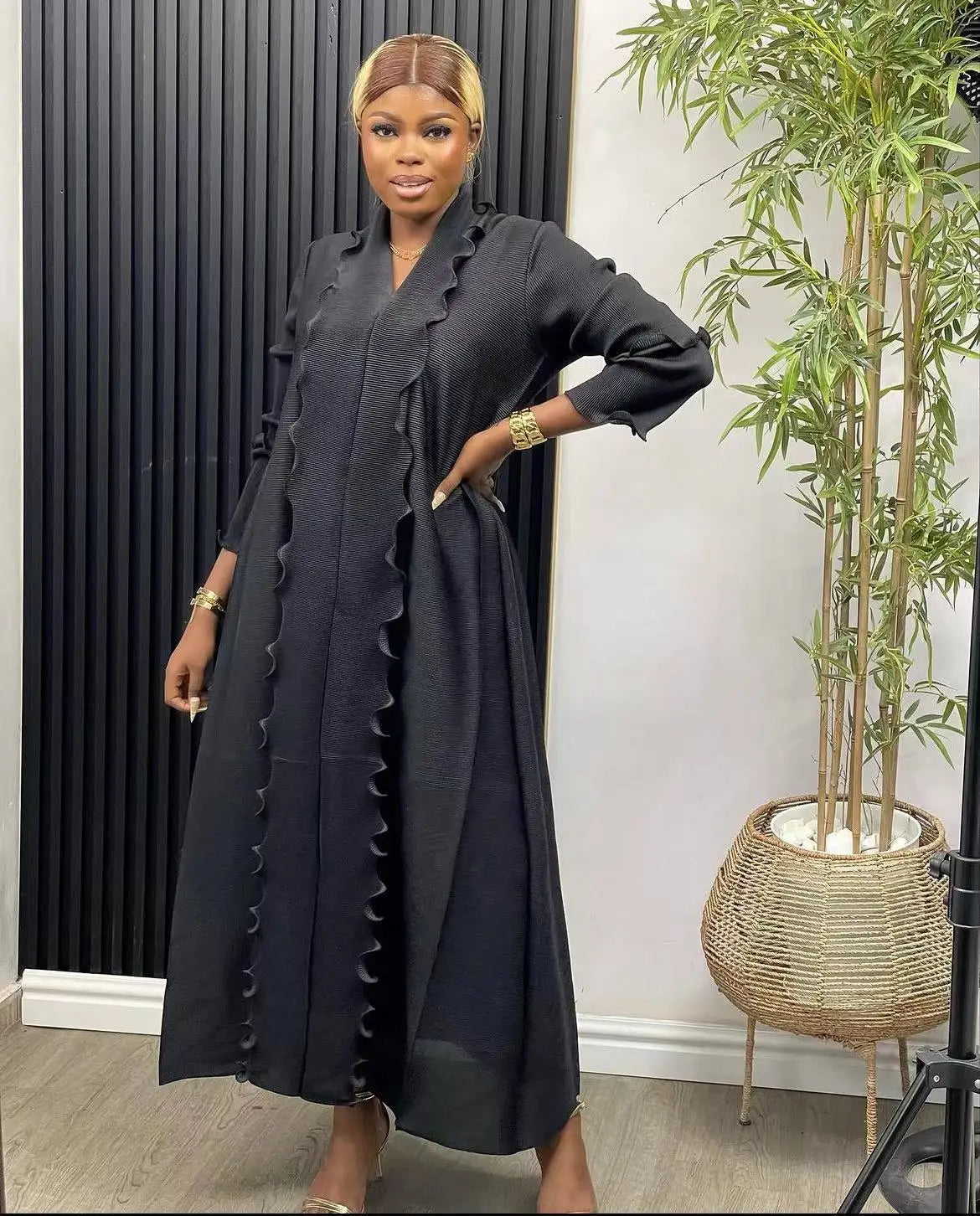 Graceful poses of a luxury women's abaya dress, embodying modest fashion with a contemporary twist, ideal for celebrations.