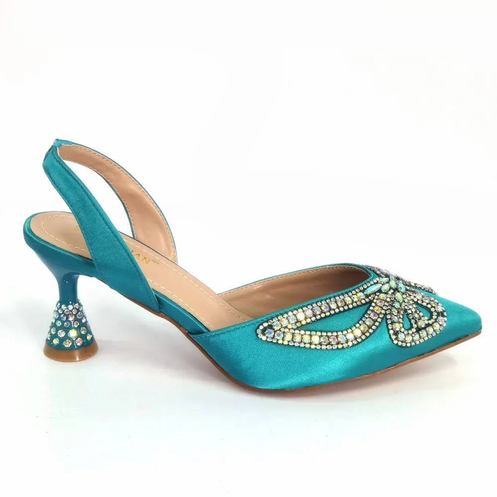 Close-up of Venus Chan yellow heel sandals showcasing intricate crystal embellishments, ideal for upscale occasions.