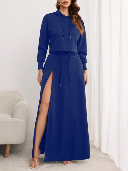 Elegant CM.YAYA Women's Two-Piece Set featuring a long sleeve hooded sweatshirt and a flowing A-Line maxi skirt, perfect for sophisticated autumn and winter streetwear.