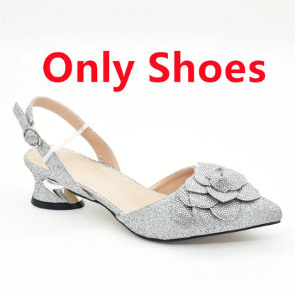 Stunning red rhinestone women's shoe and bag combo, perfect for adding a vibrant flair to formal occasions and fashionable events.