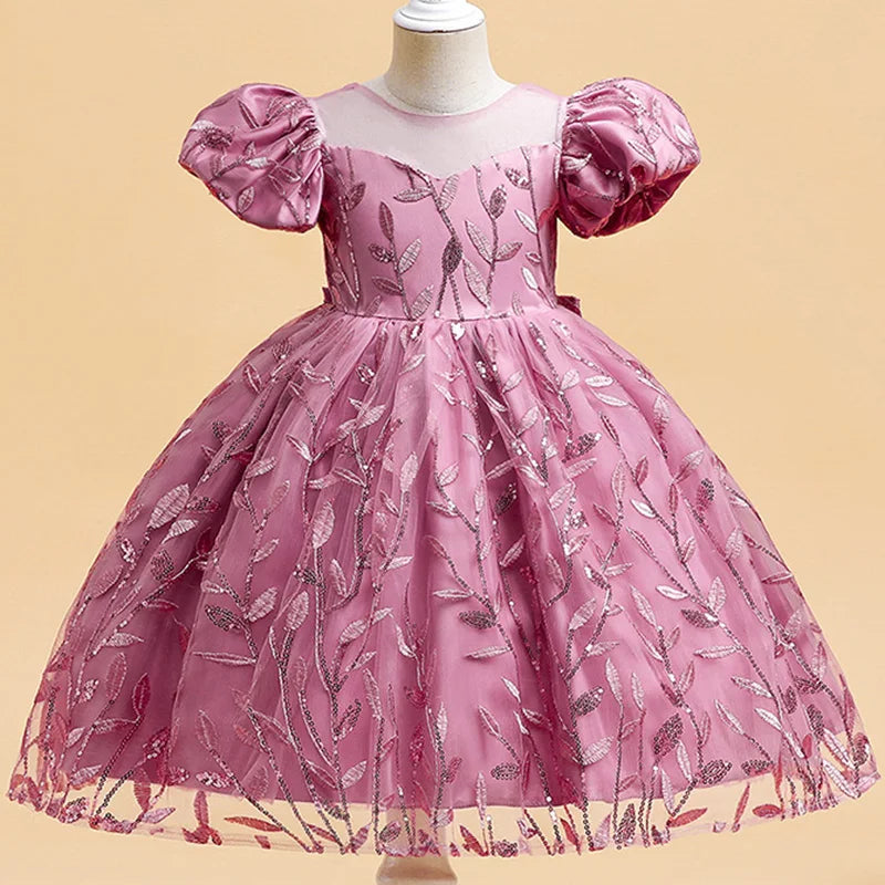 Luxury girls' princess party summer dress featuring puff sleeves and a grand back bow design, perfect for weddings and birthdays, ages 2-12.