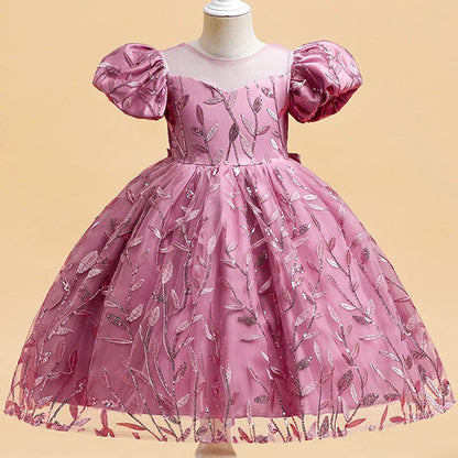 Luxury girls' princess party summer dress featuring puff sleeves and a grand back bow design, perfect for weddings and birthdays, ages 2-12.