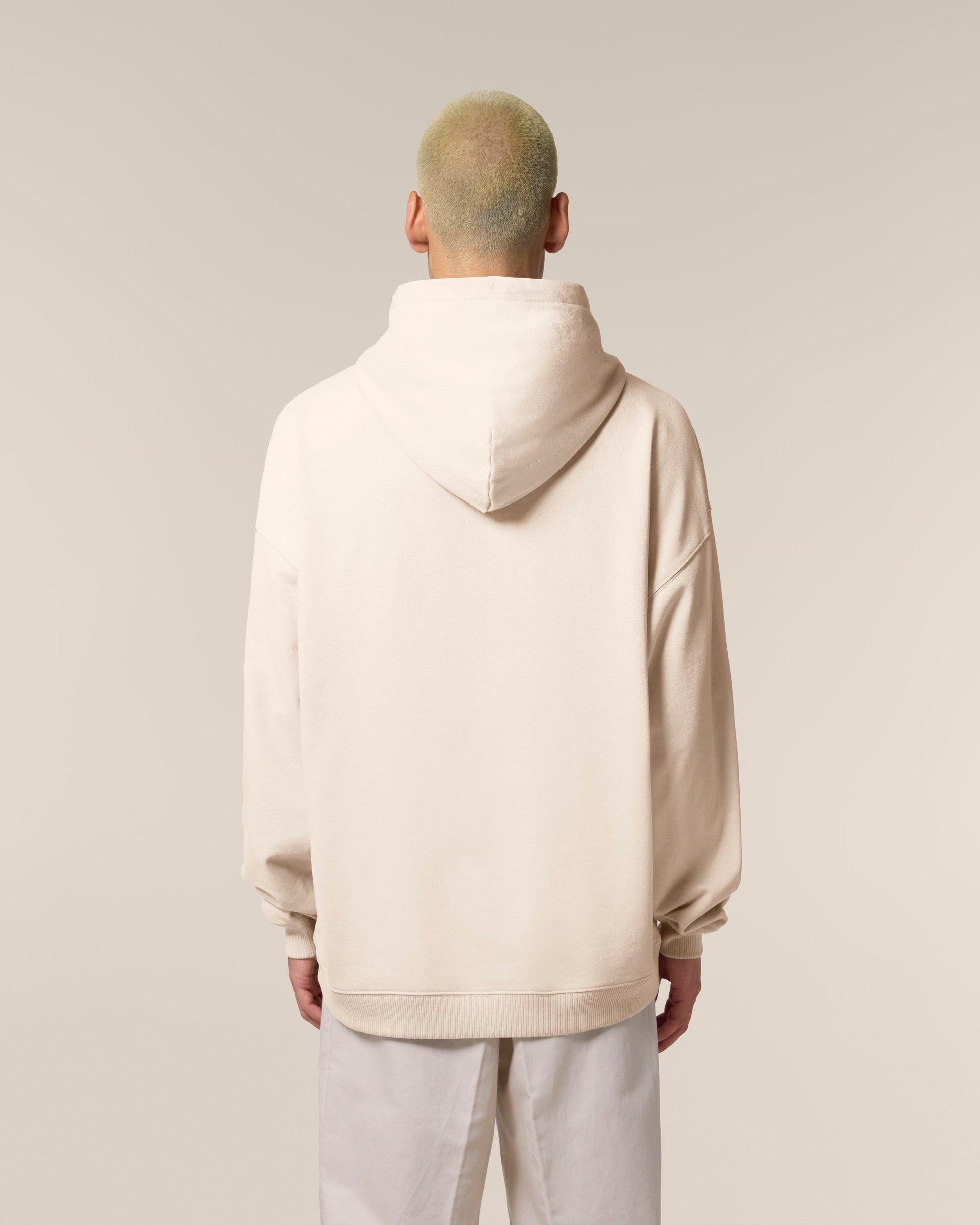 Chic and comfy oversized hoodie for both men and women, made from thick organic fabric for superior warmth and style.