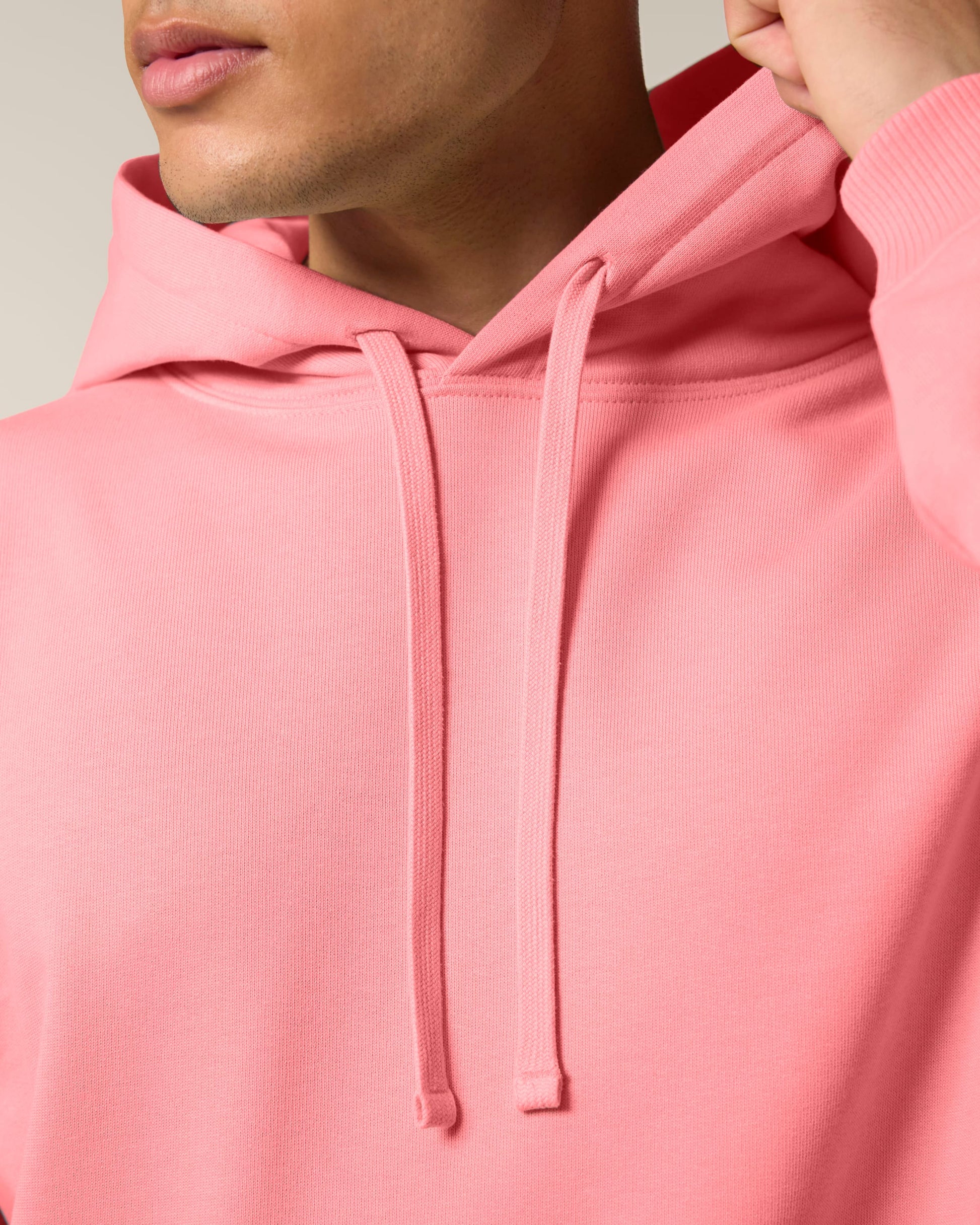 Fashion-forward unisex organic hoodie in a heavyweight design, providing casual elegance and comfort in one pristine package.