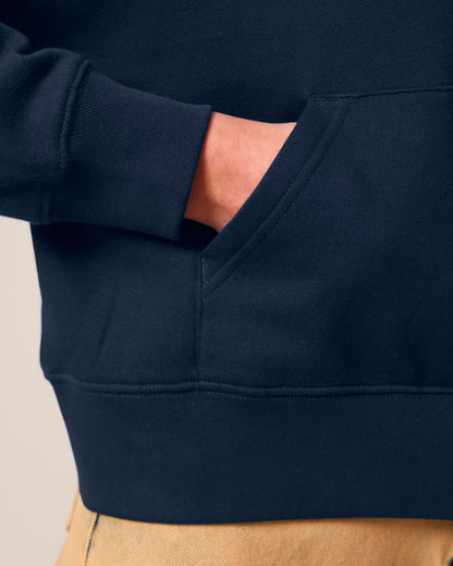 Close-up of soft 300 GSM fleece fabric on a women's hoodie, showcasing its premium organic cotton quality and brushed texture.