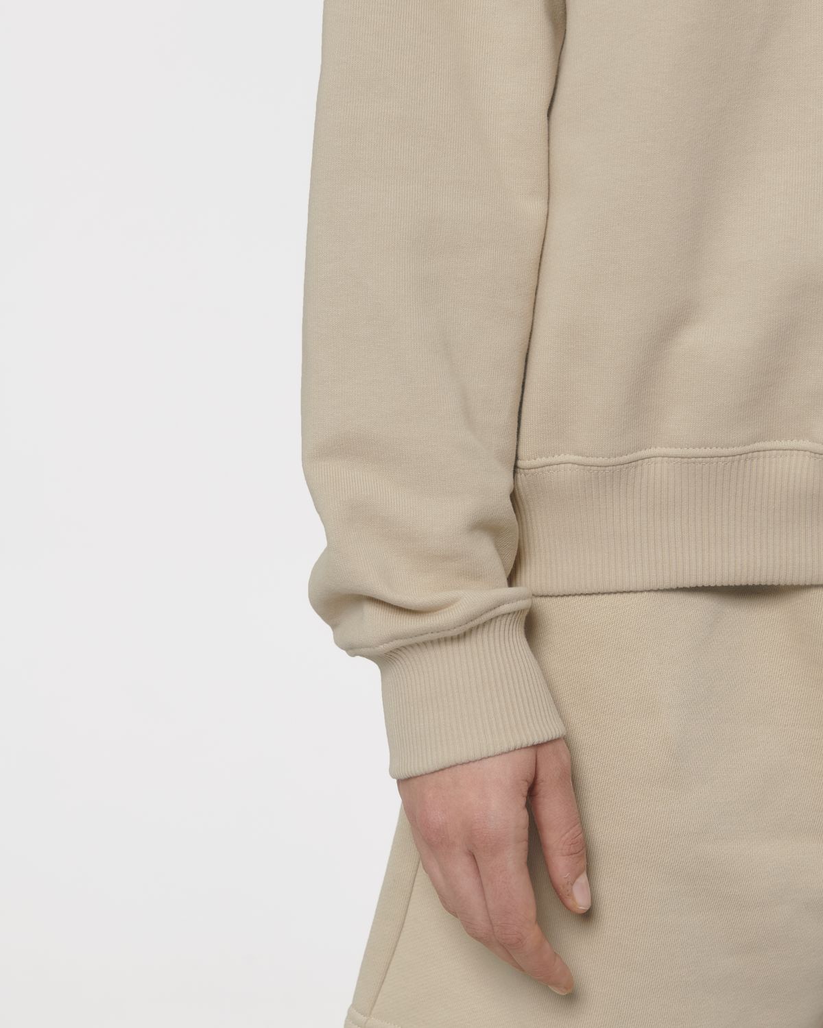 Chic styling of the unisex oversized boxy quarter zip sweatshirt, perfect for layering in cooler months or wearing alone for a bold look. The substantial weight of 400gsm enhances its structured appeal.