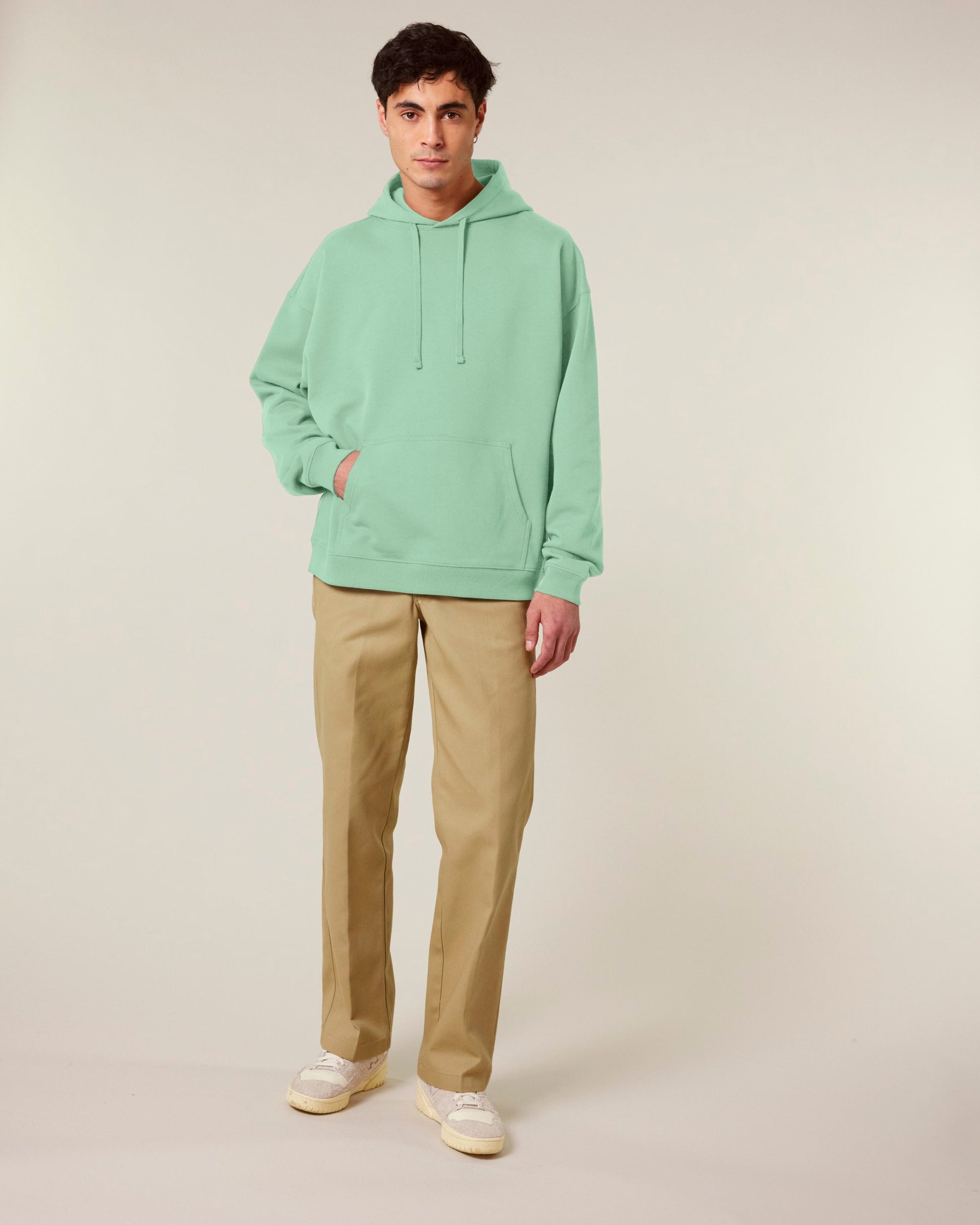 Stylish unisex oversized hoodie in a relaxed fit, crafted from high-quality organic cotton for a casual yet luxurious look.