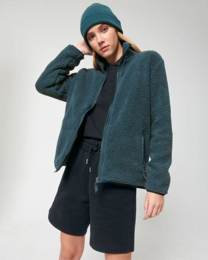 Stylish unisex environmentally-friendly sherpa jacket in a plush finish, designed for ultimate warmth and luxury.