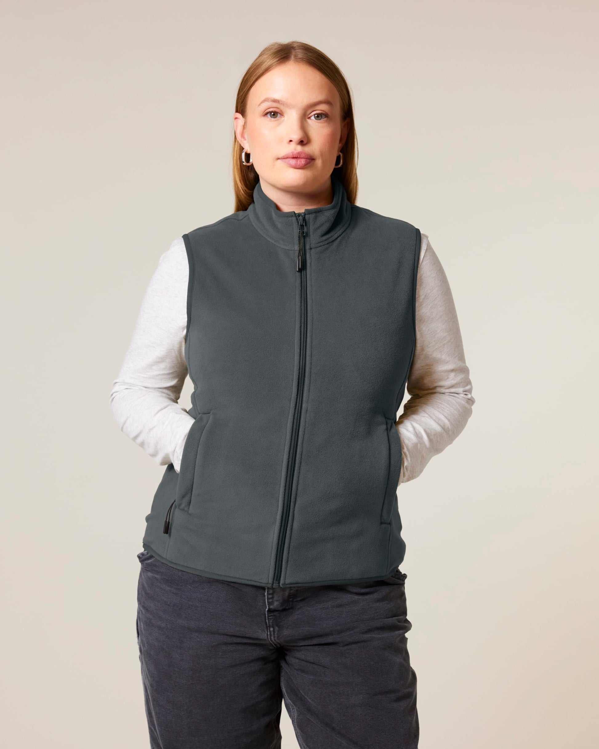 Contemporary women's fleece bodywarmer featuring a tailored fit, embodying luxury and eco-friendly sophistication.