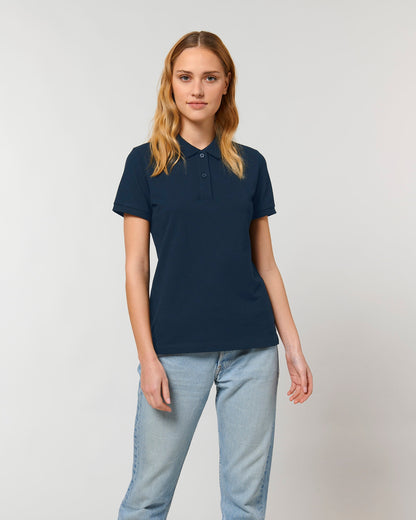 Stylish and sustainable women's polo shirt in an array of colours, made from organic cotton, highlighting its luxurious softness and eco-friendly attributes.