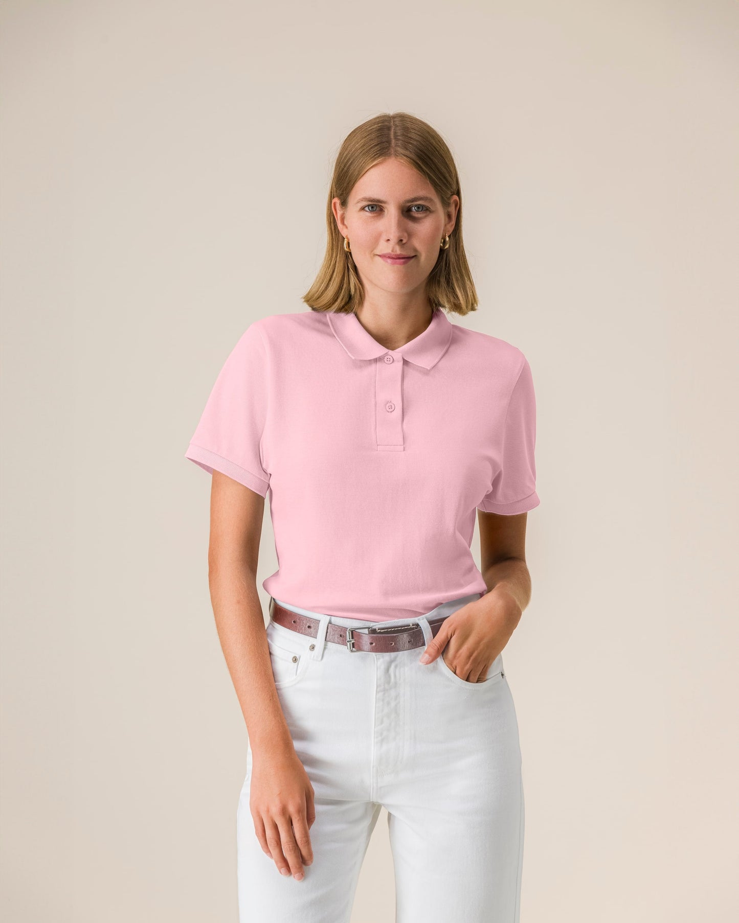 Luxury organic cotton polo shirt for women, featuring a sophisticated design in classic navy blue.