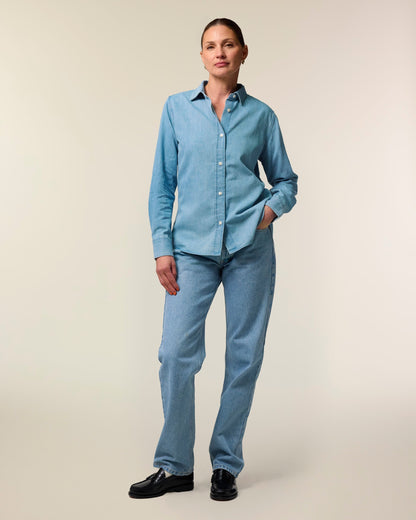 Sustainable Organic Cotton Long Sleeve Denim Shirt for Women in a chic setting, showcasing eco-friendly fashion elegance.
