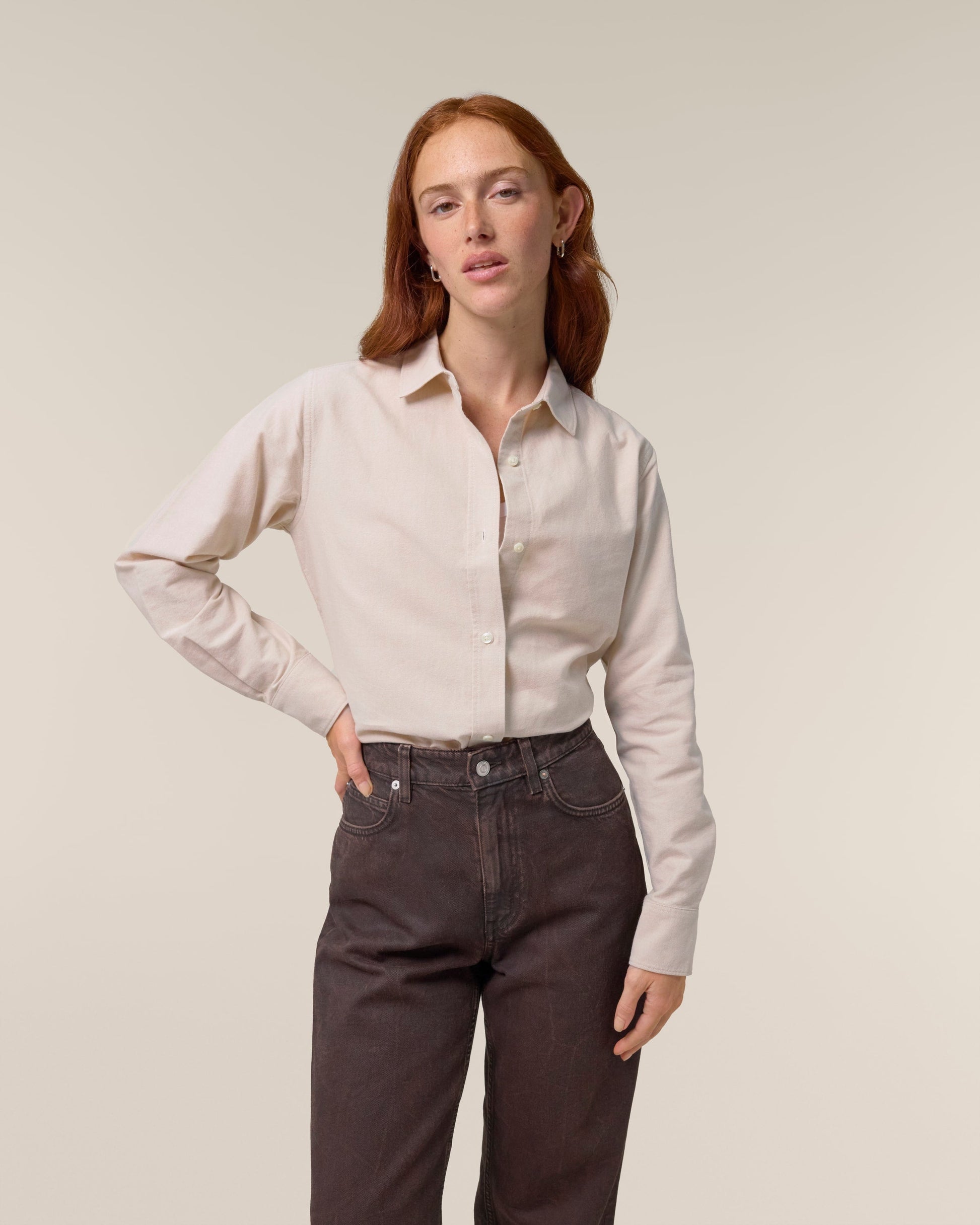 Elegant womens organic cotton oxford long sleeve shirt in a luxurious tailored fit, perfect for both professional and casual occasions.