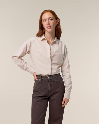 Elegant womens organic cotton oxford long sleeve shirt in a luxurious tailored fit, perfect for both professional and casual occasions.