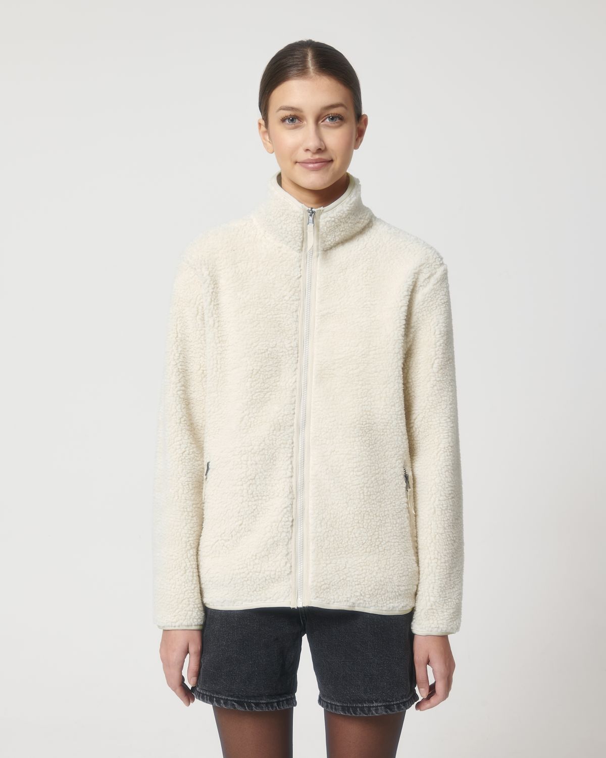 Elegant zip front closure of the eco-friendly sherpa jacket, showcasing its sophisticated design and comfort.