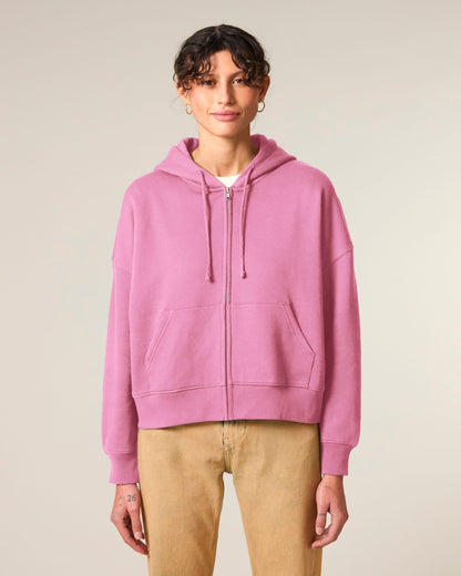 Stylish women's hoodie worn open over a tee, highlighting its versatile layering options and elegant silhouette for casual and elevated looks.