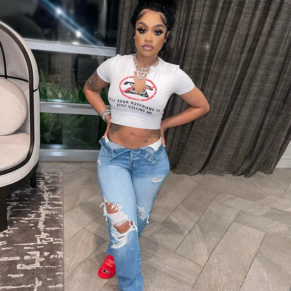 Luxury white graphic crop top by Dazzling Dreams Studio featuring the slogan 'Tell Your Boyfriend to Stop Calling Me'