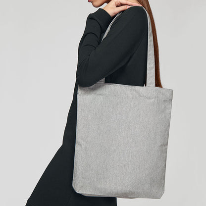 Luxurious woven tote bag showcasing its elegant design and spacious interior, perfect for everyday chic style.
