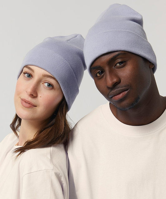 Luxury unisex ribbed beanie crafted from organic cotton and recycled polyester, featuring a foldable brim in elegant colours.