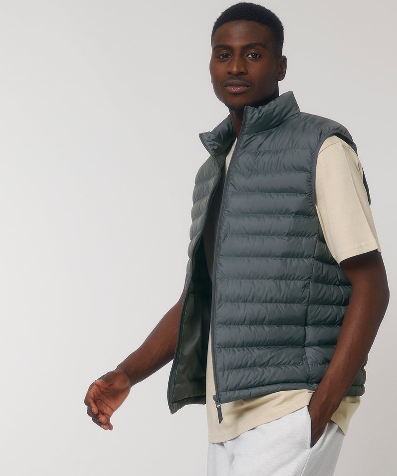 Luxury men's puffer bodywarmer made from 100% recycled polyester, featuring a sustainable fashion design ideal for layering.