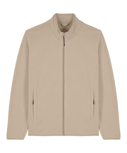 Men wearing a luxurious recycled fleece jacket in a casual setting, demonstrating comfort and sustainable fashion.