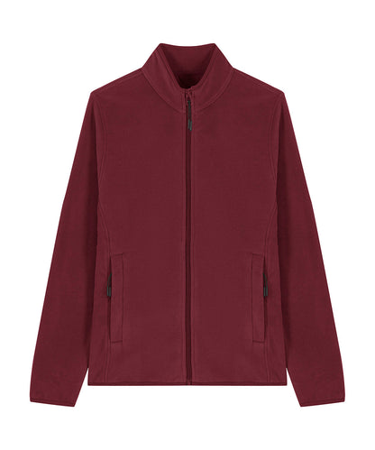 Sustainable and stylish Women's Fleece Jacket layered for winter fashion, made from post-consumer plastic bottles, perfect for eco-conscious wearers.
