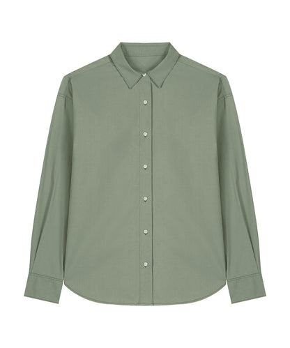 Men's organic cotton long sleeve shirt in a sophisticated setting, emphasizing its versatility for both formal and casual occasions.