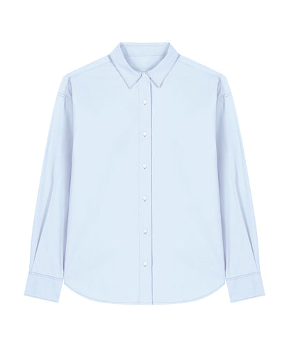 Stylish model wearing a luxury organic cotton poplin shirt, epitomising contemporary elegance and sustainable fashion.