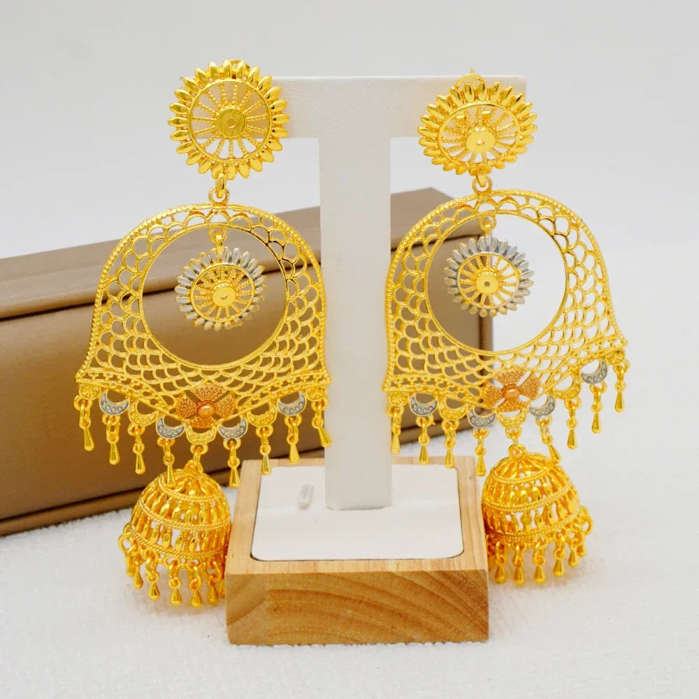 Beautiful women's earrings featuring luxurious gold colour geometric shapes and alluring tassels, perfect for making a statement at parties.