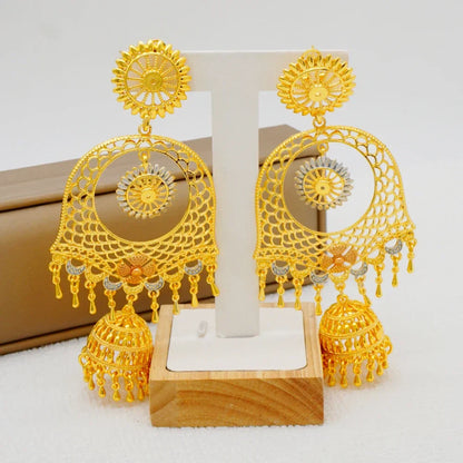 Beautiful women's earrings featuring luxurious gold colour geometric shapes and alluring tassels, perfect for making a statement at parties.