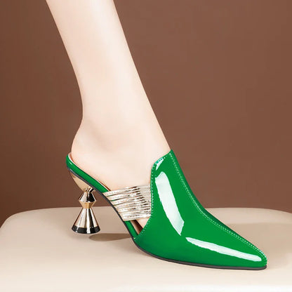 Elegant high heel slippers for women featuring a sleek pointed toe design and stylish metal heel, available in luxurious black and green options.