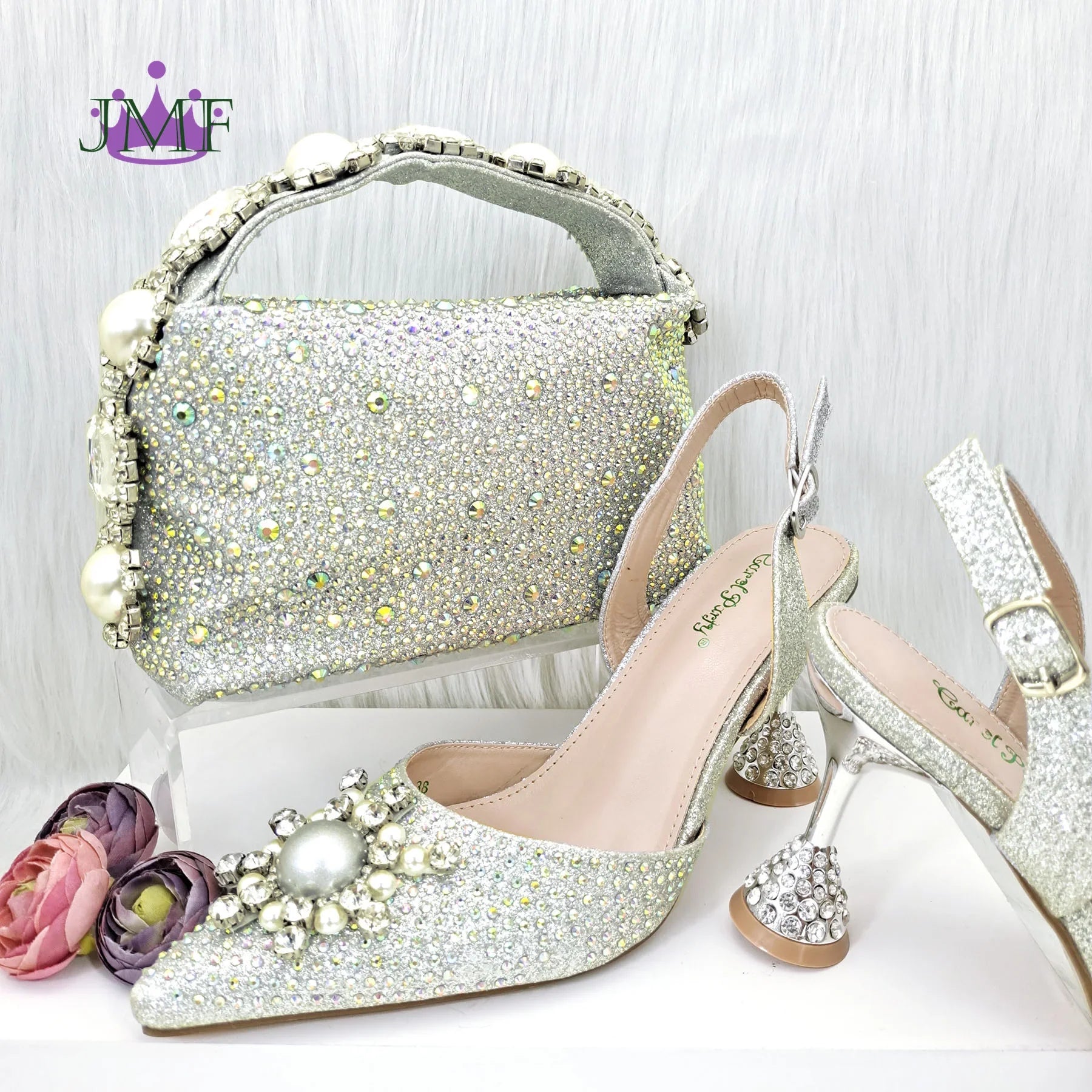 Glamorous pointed toe blue stiletto sandals for women, combining fashion and luxury with a touch of sparkle from rhinestones.