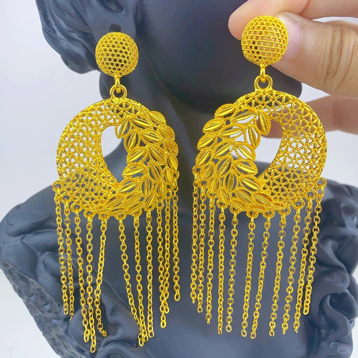 Luxurious 24K Gold Plated drop earrings, designed in an exquisite African motif, ideal for elevating any formal attire with a touch of elegance.