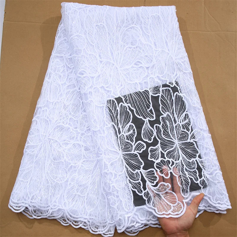 Exquisite African Milk Silk Mesh Lace Fabric featuring elegant sequins, perfect for luxurious Nigerian wedding dresses, with a width of 51-52 inches.