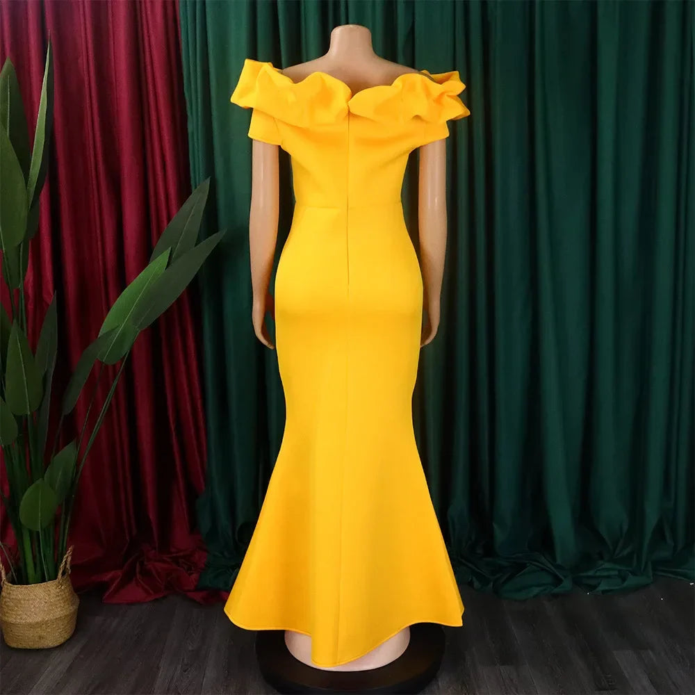 Full-length view of an elegant mermaid dress for women, designed for special occasions with a striking floor-length silhouette and off the shoulder style.
