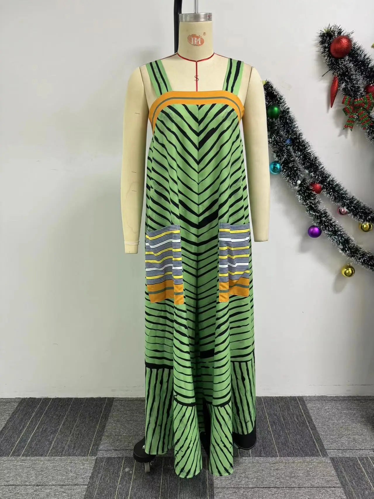 Luxury CM.YAYA Women’s Striped Wide Leg Sleeveless Jumpsuit showcasing elegant stripes and a flattering high waist design, ideal for summer occasions.