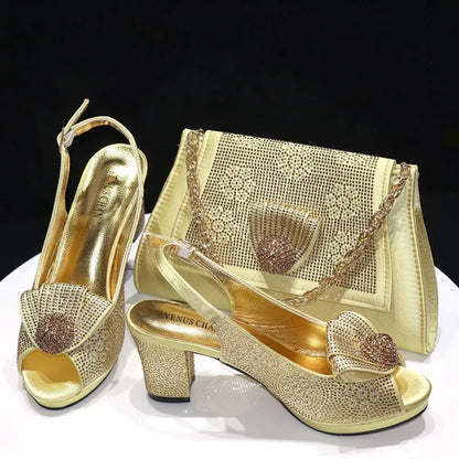 Stylish Venus Chan matching handbag in golden hue, adorned with sparkling diamonds to complement the high-heel wedding shoes.
