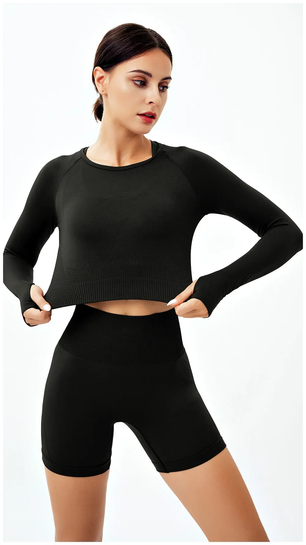 Sophisticated WAREBALL women's seamless yoga set in pink, featuring a chic sports bra and comfortable leggings designed for yoga and fitness enthusiasts.