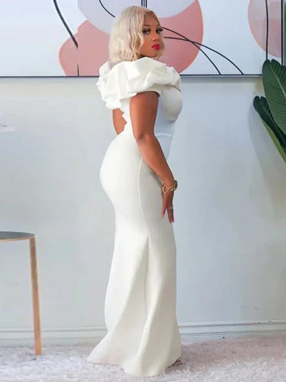 Elegant off-shoulder mermaid evening dress in a stunning floor-length design, perfect for women seeking a luxurious and sexy look for special occasions. Available in sizes M-XXXL, crafted from high-quality polyester for a comfortable fit.