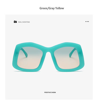 Stylish women's sunglasses featuring a unique oversized square design in vibrant gradient orange, equipped with UV400 lenses for optimal eye protection.